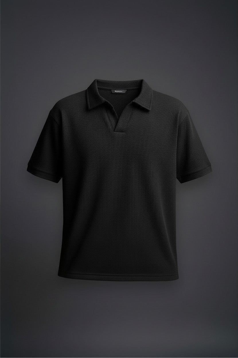 RADIUS Obsidian black waffle-knit polo shirt with a minimalist placket-less V-neck and crisp integrated collar.